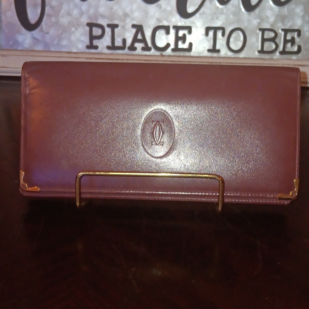 CARTIER EUC BURGUNDY LEATHER LONG BIFOLD WALLET